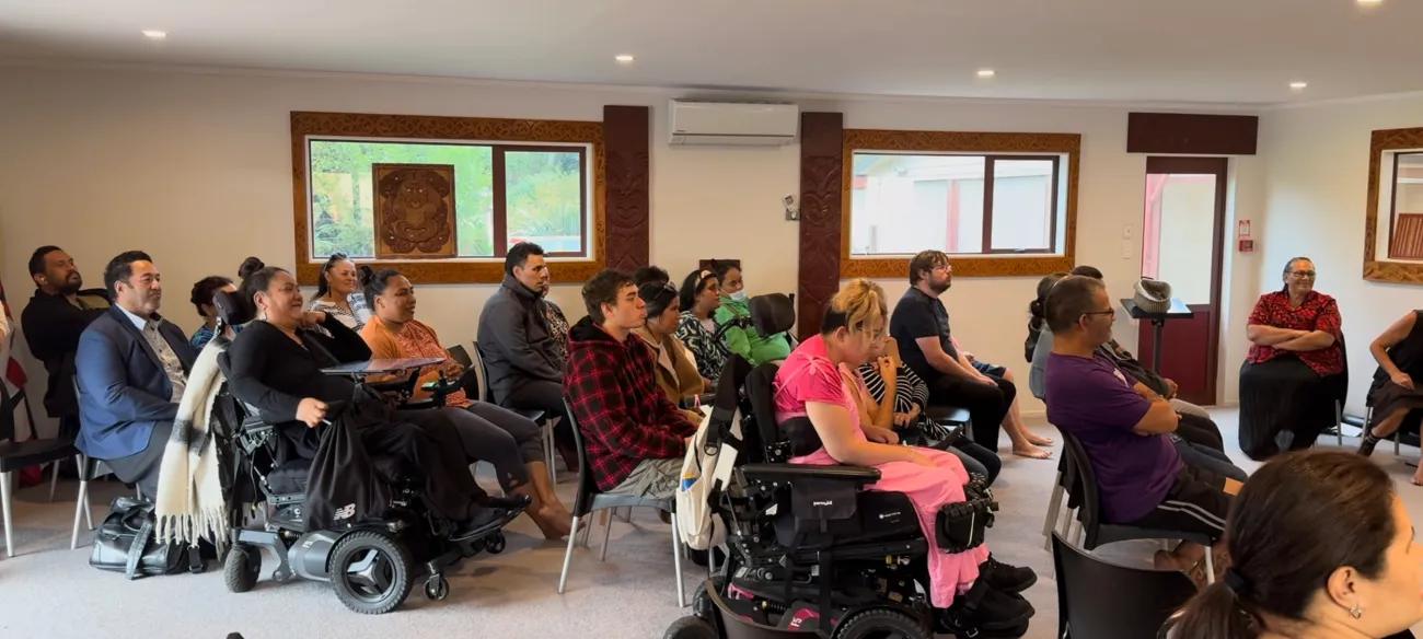 Whanau hauā gathered in a hui